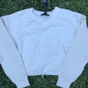 White sweatshirt with knit sleeves